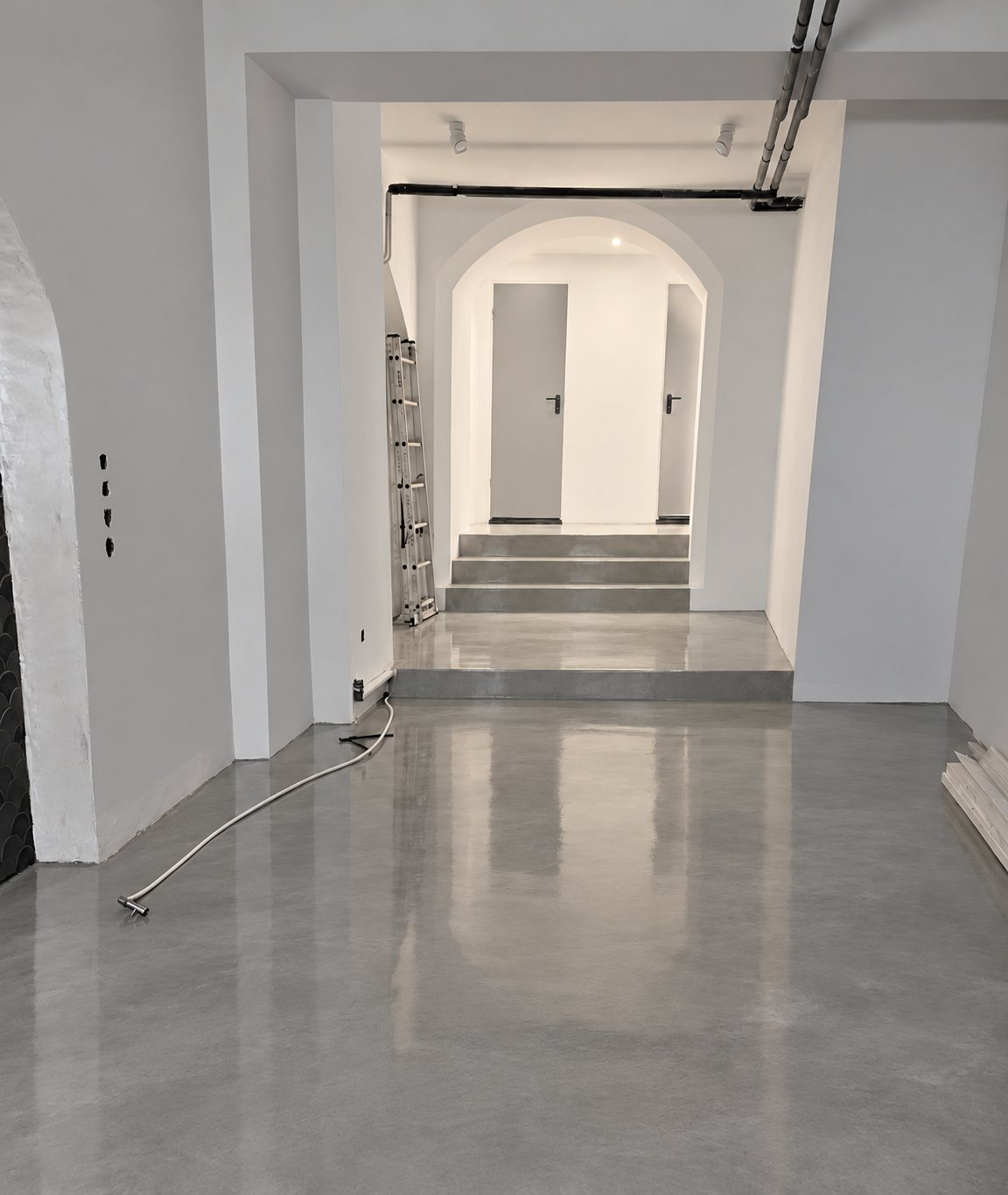 Visualization of the finished shop: the same view after plastering, with the finished floor and lighting