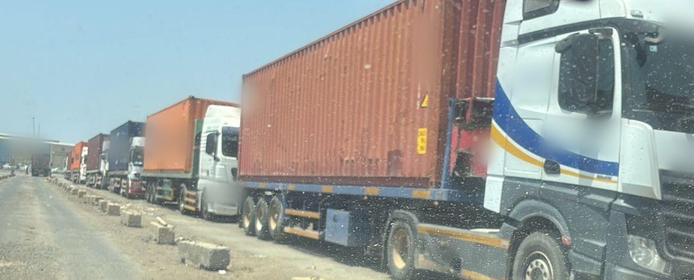 Storage containers arriving on trucks
